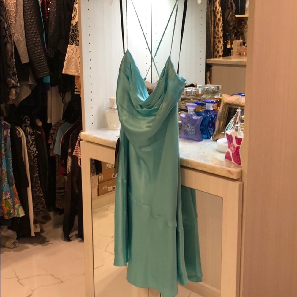 Dress from Bebe’s Luxurious Pure Silk Line